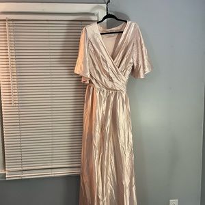 Peach pink satin plus-sized bridesmaid dress.